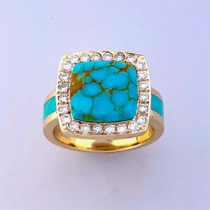 Yellow Ring with a Turquoise Center Stone with a Diamond Halo surrounding